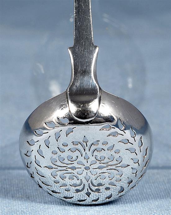 An early Victorian silver fiddle pattern sifter spoon, by John Harris IV & 2 others, 111 grams.